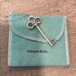 Tiffany & Co large fleur de lis sterling silver key necklace